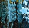 Beaded jewelry with blue teal turqouis gems and gold and silver