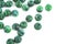 Beads made of natural malachite on a white background are isolated