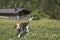 Beagle in front of alpine hut