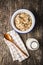 Beakfast cereals in bowl. Healthy muesli with oat flakes, nuts and raisins