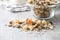Beakfast cereals on table. Healthy muesli with oat flakes, nuts and raisins