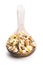 Beakfast cereals in wooden spoon.  Healthy muesli with oat flakes, nuts and raisins