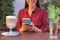 Beaming woman having coffee break with her friends