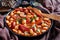 Beans stew with sausages in a bowl