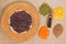 Beans in wicker plate, scoop, different varieties of lentils