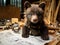 Bear cub architect with blueprints in nature