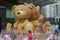 The bear Father and mother with two little baby in SHENZHEN coastal city square