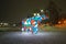 Bear garland. Multi-colored sparkling electric New Year Christmas bear on snow at night. Installation figure