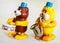 Bear, lion, drums and blowing saxophone , marching band wind up toy / Isolated white