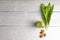 Bear`s onion pesto, wild garlic, walnuts and pesto on white wooden background