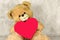 Bear Teddy with a heart loves you
