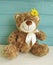 Bear toy wooden flower background