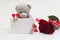 Bear, valentine and rose on a white background