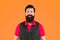 Beard divides boys from men. Bearded man orange background. Happy hipster with long beard hair. Grooming mustache and