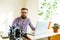 Beard young man working from home