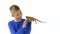 Bearded agama sitting on the hand of boy and he carefully examines it at white background. Slow motion.