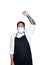 Bearded asian men waiter, chef dressed in black apron with medical mask is feeling serious raising fist up in white background.The