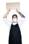 Bearded asian men waiter, chef dressed in black apron with medical mask is holding cardboard in white background.The concept of