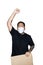 Bearded asian men worker dressed in black tees with medical mask is feeling serious raising fist up in white background.The