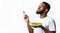 Bearded Black Guy Enjoying Vegetable Salad Standing Over White Background