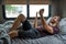 A bearded brown haired hypster man wearing a red t-shirt lays down laughing relaxing on his bed in his camper talking to someone