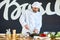 Bearded Chef Cutting Eggplant