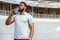 Bearded dark-haired young man with a water bottle