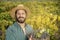 Bearded farmer in vineyard