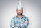 Bearded funny man in a cap of aluminum foil. Concept art phobias