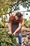 bearded good looking gardener in linen