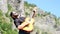 A bearded guy in a black shirt and sunglasses pretends to play a smoky acoustic guitar. Strange funny video for a music video on a