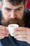 Bearded guy enjoy aroma fresh espresso. Guy relaxing with espresso coffee. Coffee break concept. Hipster drinking coffee