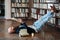 Bearded hipster man relax and reading book lies on the floor