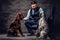 Bearded hunter wearing elegant clothes sitting on a sofa with his two purebred Setter dogs.