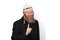 Bearded jewish man with sidelocks in white kippah hinting do not try to deceive me. Sly jew showing warning with finger