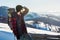 Bearded male hiker on a snowy mountain