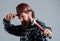 bearded male hipster in checkered shirt and laborer helmet, selective focus, hammer