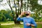 Bearded man blowing soap bubbles