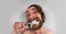 Bearded Man Brushing Teeth