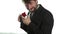 Bearded man in a business suit gives a ring in the red box and expresses different emotions