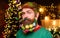 Bearded man with decorated beard for New Year party. Merry Christmas. Happy New Year. Christmas beard style. Christmas