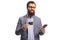 Bearded man with glasses holding a credit card and a mobile phone