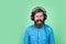 bearded man listen music. brutal hipster wear headphones. online education. just have fun. unshaven guy listening ebook