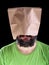 Bearded man with paper bag on his head smiling