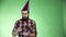 Bearded man putting on a party hat
