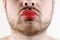 Bearded Man`s Mouth with Red Lipstick on his Chubby Lips