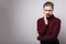 Bearded man with strong toothache over grey background