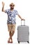 Bearded man with a suitcase waving at the camera