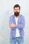 Bearded man with unshaven beard hair in casual fashion style keep arms crossed blue background, hipster