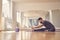 Bearded man using wireless robot camera during yoga session